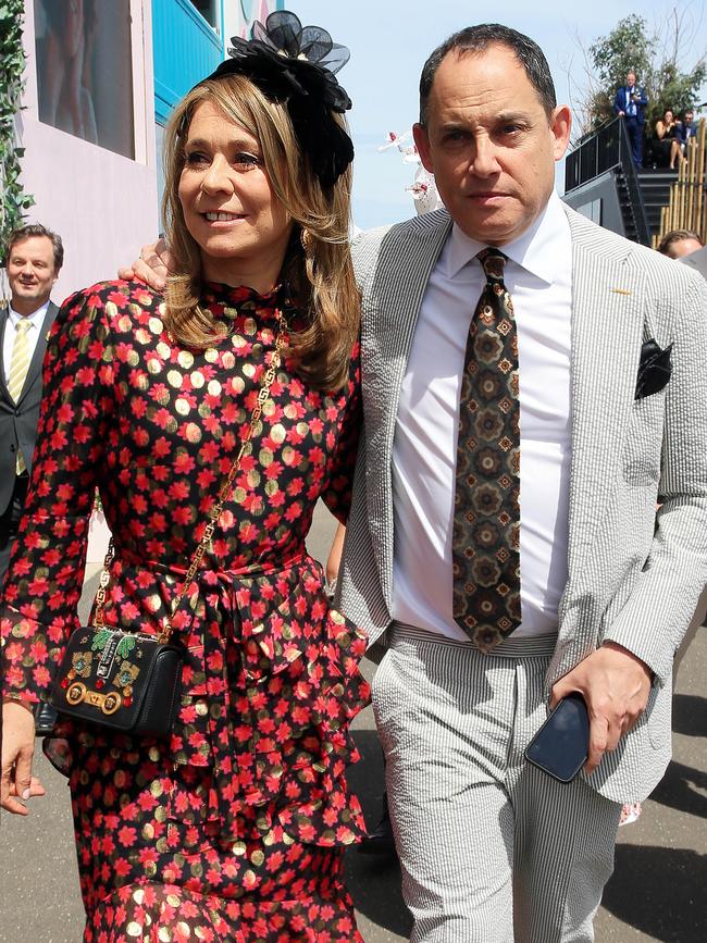 Raphael Geminder with his wife Fiona in the Birdcage during the Melbourne Cup at Flemington racecourse. Picture: Aaron Francis
