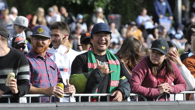 Fans enjoy the carnival atmosphere at the NRL match between Cronulla Sharks and Gold Coast Titans at C.ex Stadium Coffs Harbour.