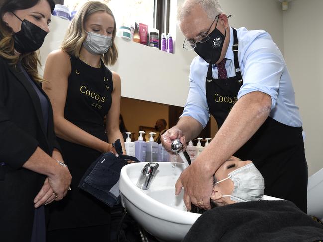 Prime Minister Scott Morrison meets locals at Coco's Hair Salon while touring at Mount Eliza, south of Melbourne. Picture: NCA NewsWire / Andrew Henshaw