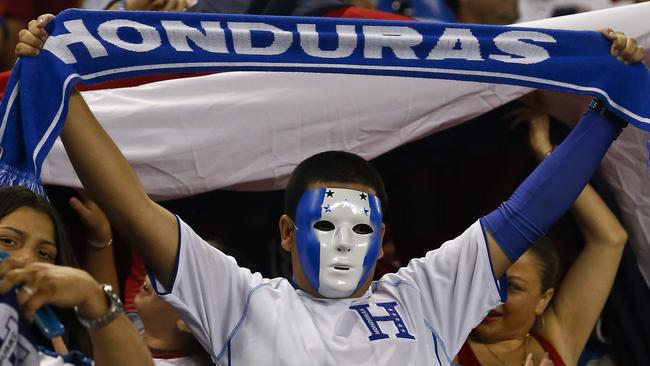 A Honduras fan in the stands.