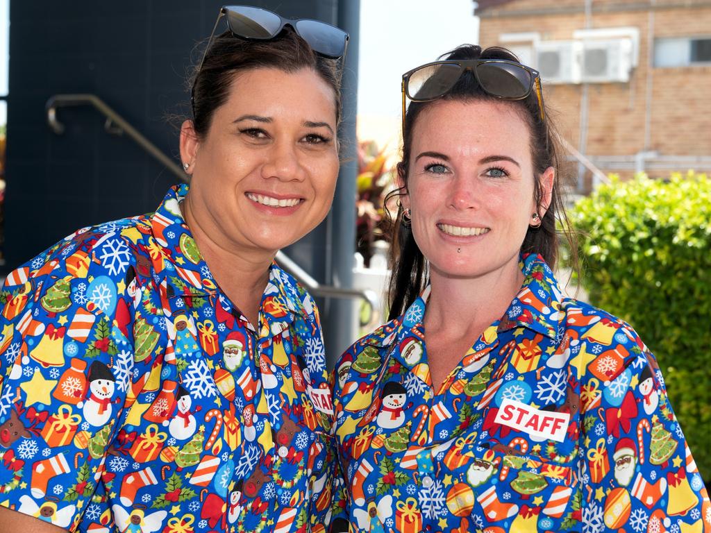 Tennille Swart and Nicky Evans at the Hawaiian Christmas Race Day. Mackay Turf Club, Ooralea. Picture: Michaela Harlow