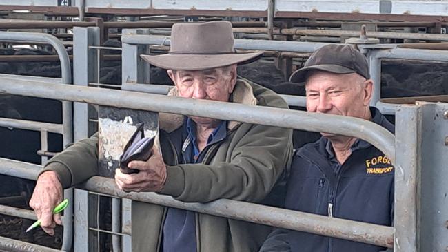 North East farmer Michael Hourigan, Millewa near Wangaratta, bought a line of 50 light Angus steer calves paying to $1030 at Euroa today. They were to replace a load of feeder steers that he sold last week for an average of $1715. He is pictured with agent Hamish Falla, Nutrien Wangaratta. Picture: Jenny Kelly