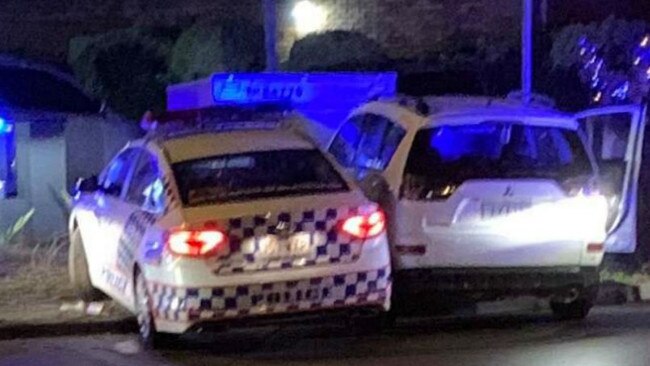 Police and the stolen car at the scene. Picture: MyGC