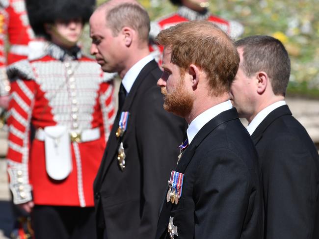 Prince William, Prince Harry and their cousin Peter Phillips walk behind Prince Philip’s coffin. Picture: Getty Images