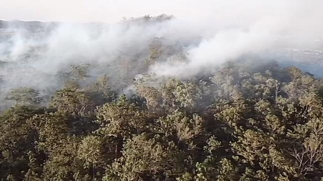 Photos of smoke rising over Oxenford taken via drone. Photo: Brent Simpson