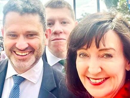 A “clearly annoyed” Police Minister Joe Szakacs tries to get the love with best mates Attorney-General Kyam Maher and Deputy Premier Susan Close.