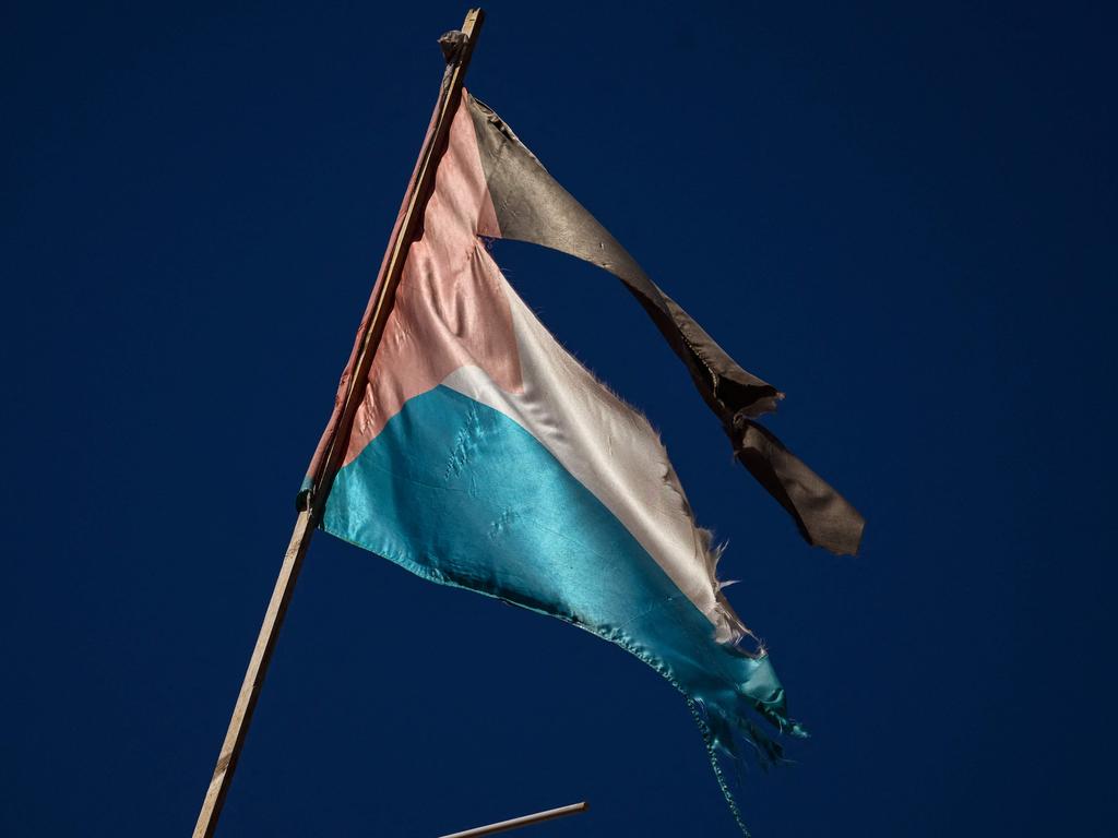 A ripped Palestinian flag stands at the Jenin camp in the West Bank on November 4, 2023, as Picture: AFP.