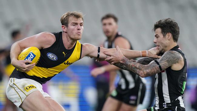 The stakes are high for both Richmond and Collingwood in their Sunday twilight clash. Picture: AAP Image/Michael Dodge