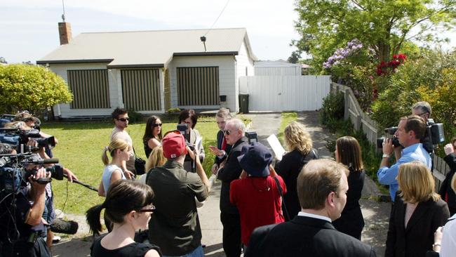 Coroner Graeme Johnstone outside Greg Domaszewicz's former house in Moe.