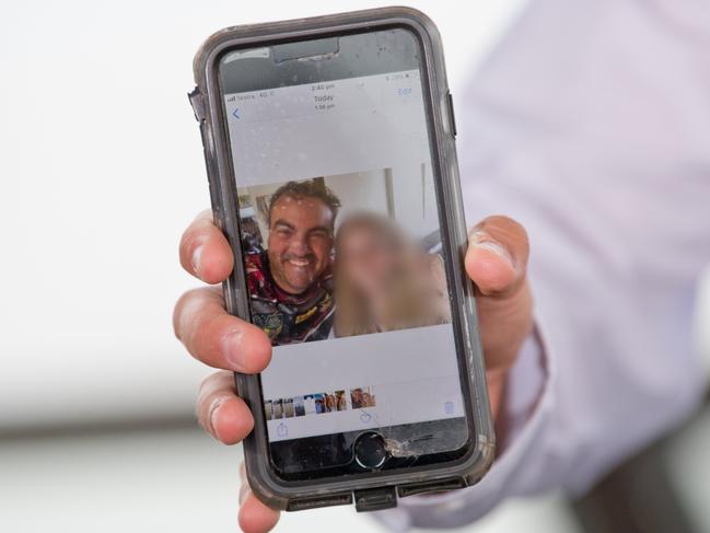 Member for Whitsunday Jason Costigan shows a selfie taken with the complainant.