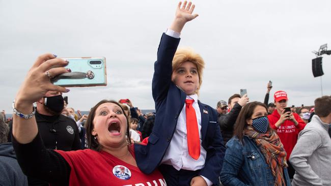 A young Trump supporter dressed as the President at a rally in Martinsburg, Pennsylvania. Picture: AFP