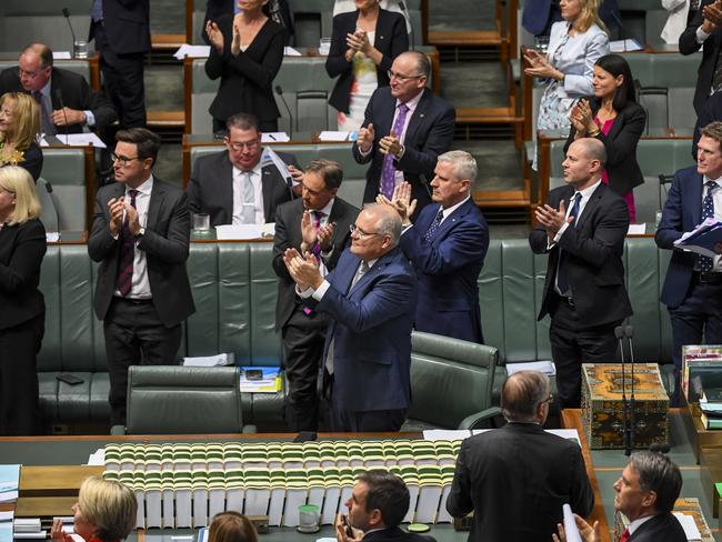 Australian Prime Minister Scott Morrison and fellow MPs applauded Mr Weeks. Picture: Lukas Coch