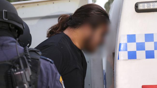 Alou during his arrest. Picture: NSW Police Media