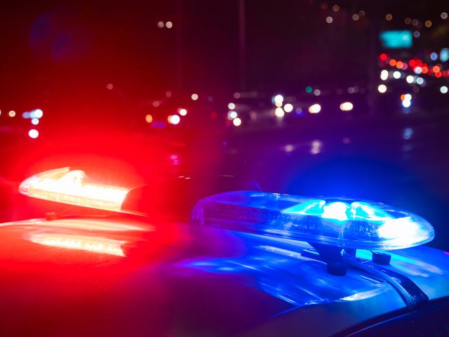 police car in night light street