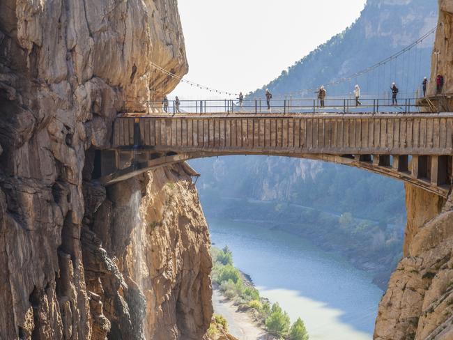 Visitors crossing the suspension bridge at Gaitanes Gorge, Malaga, Spain.Picture: iStockSunday Escape, Spain, Jane Armitstead