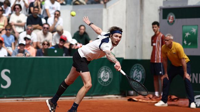 Kazakhstan's Alexander Bublik overcame a slow start to win in 5 sets against Alex de Minaur. (Photo by Anne-Christine POUJOULAT / AFP)
