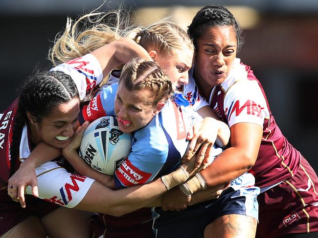 NSW Samantha Bremner is tackled during the Interstate Challenge.