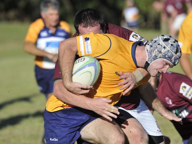 SCU player keith Morris is tackled during the game against Casino at Southern Cross University in Lismore . Rugby Union. Photo Marc Stapelberg / The Northern Star