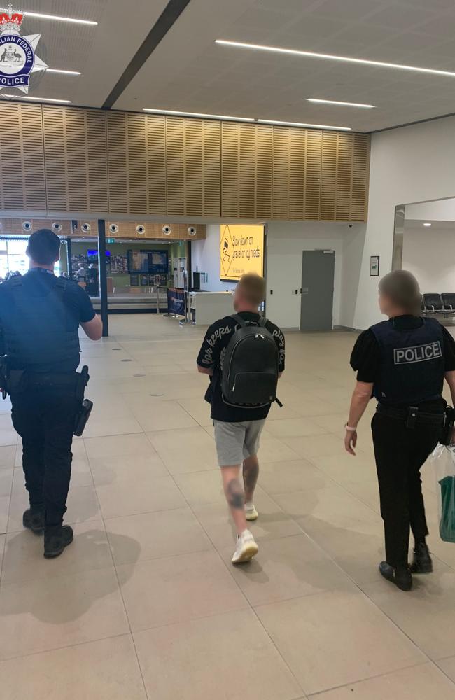 A 38-year-old Alexandria man being arrested at Hobart Airport on Thursday, November 9, 2023. Picture: AFP/ Tasmania Police