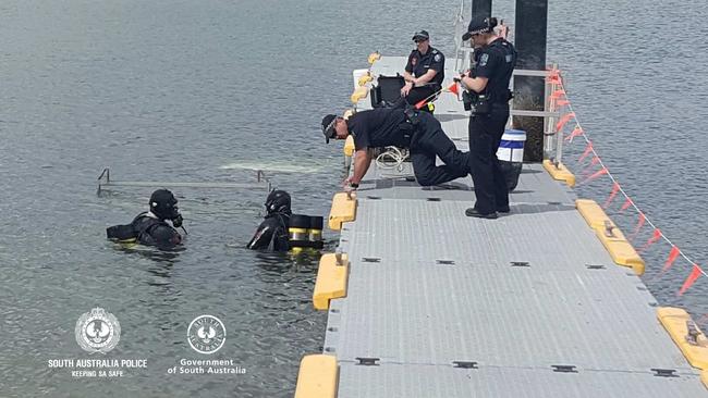 SA Police divers with a car dumped into the ocean at the Port Augusta boat ramp.