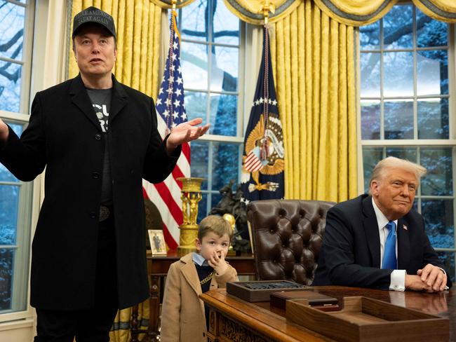 Elon Musk speaks as his son X Æ A-12 and US President Donald Trump look on in the Oval Office of the White House. Picture: AFP
