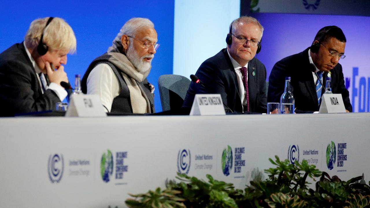 British Prime Minister Boris Johnson, Indian Prime Minister Narendra Modi, Australian Prime Minister Scott Morrison and Jamaican Prime Minister Andrew Holness attended a meeting at the summit. Picture: Getty images.