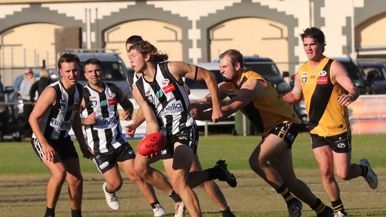 North Geelong's Rory Desnoy looks to handball. GDFNL North Geelong v Bannockburn. Picture: Alan Barber