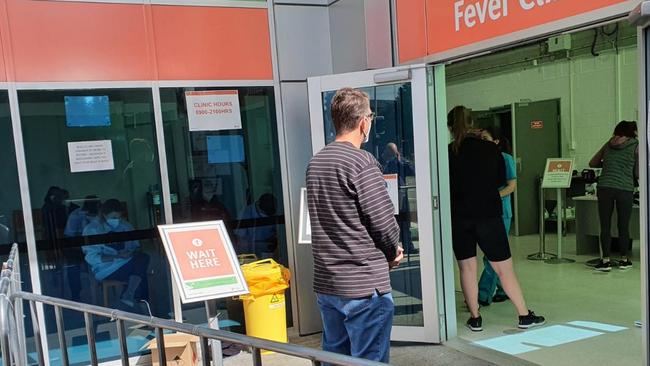 Lines to be tested for COVID-19 at the Gold Coast University Hospital fever clinic.