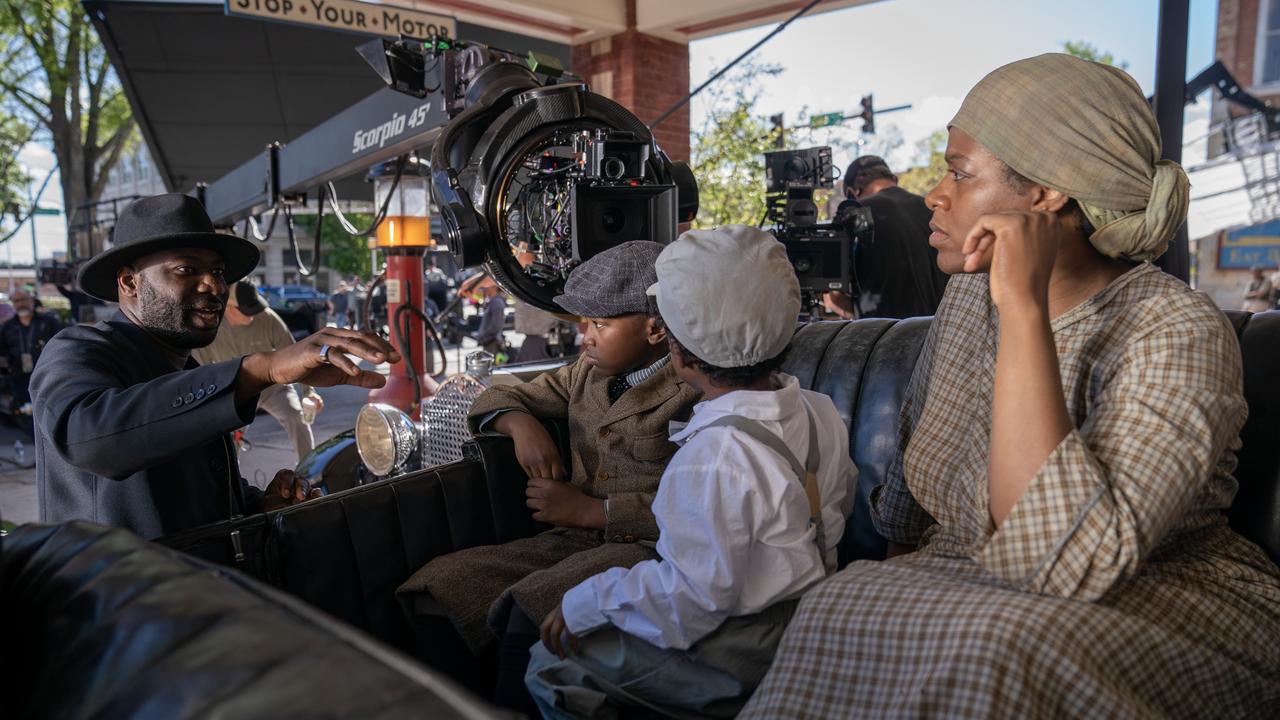 Director Blitz Bazawule (left) helped convince Fantasia Barrino (right) to reprise her Broadway role of Celie in The Color Purple.