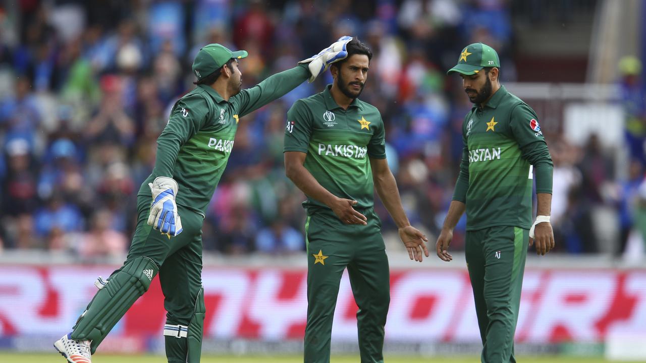 Pakistan's Hasan Ali celebrates taking the wicket of India's Rohit Sharma. (AP Photo/Dave Thompson)