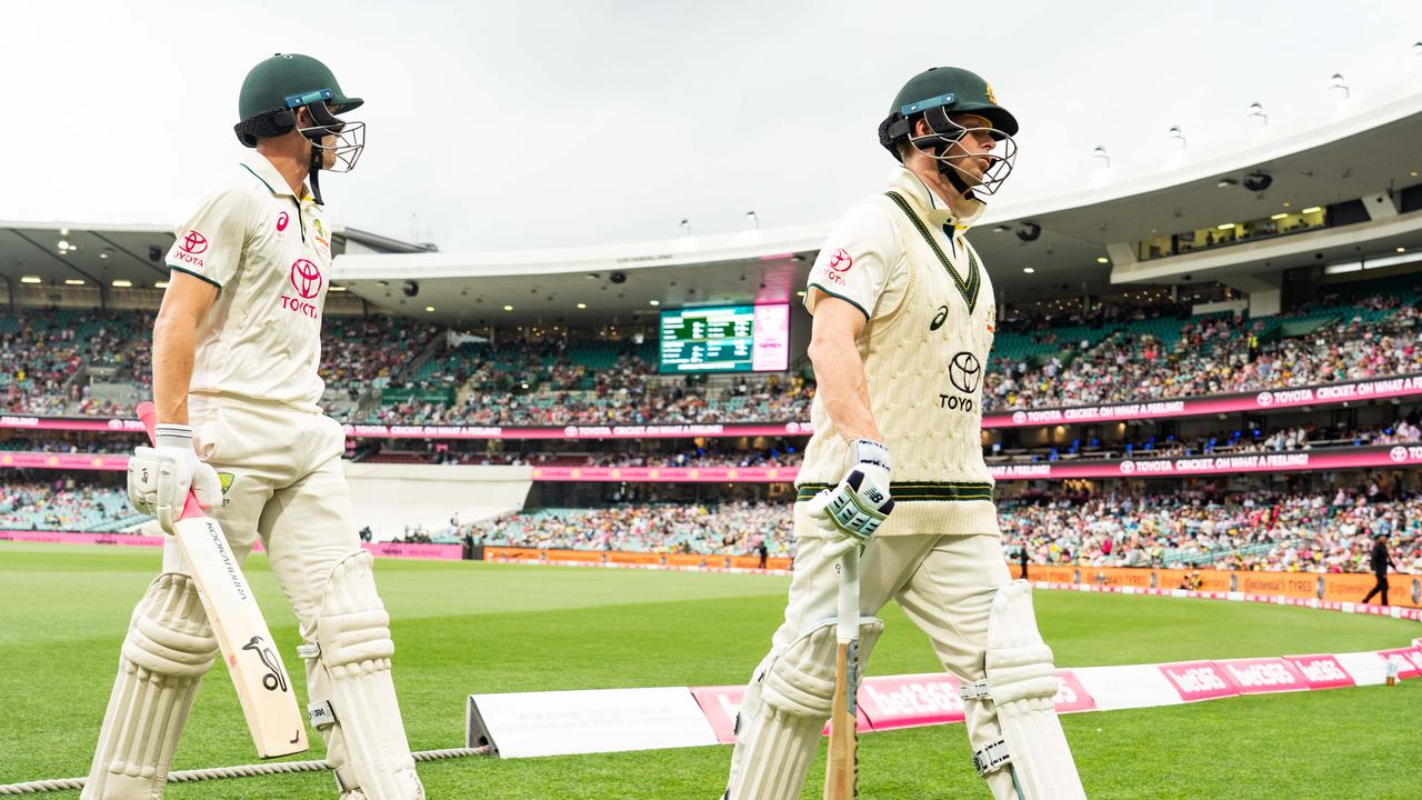 Marnus Labuschagne and Steve Smith walk off the ground due to bad light. Photographer: Tom Parrish