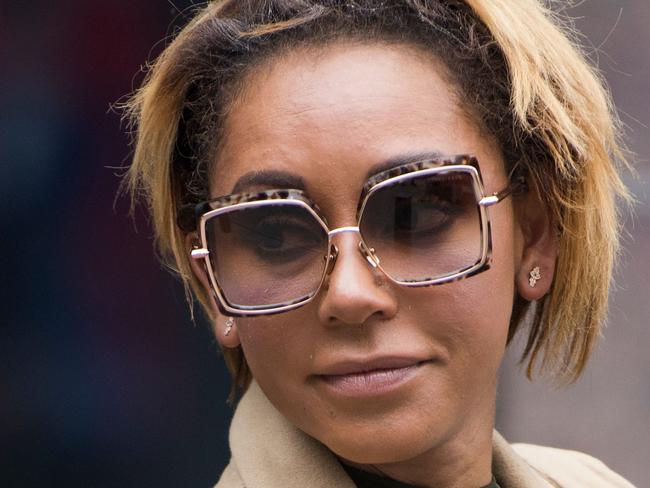 Melanie Brown (Spice Girl Mel B) leaves Los Angeles Superior Court Stanley Mosk Courthouse, in Los Angeles, California, November 9, 2017.  Attorneys for Brown and her estranged husband Stephen Belafonte told Judge Mark Juhas in court November 9, 2017 that they had settled the domestic violence portion of the divorce case. / AFP PHOTO / Robyn Beck