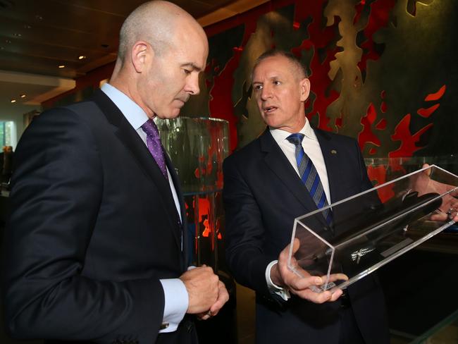 Defence SA chief executive Andy Keough and Premier Jay Weatherill with Shortfin Barracuda model at the DCNS headquarters in Paris. Picture: Calum Robertson