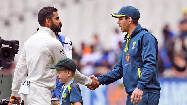 India's captain Virat Kohli (L) shakes hands with Australian captain Tim Paine (R). Picture: AFP