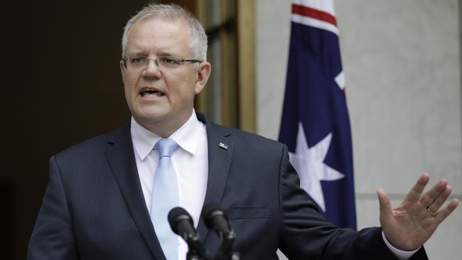 Scott Morrison has personally approved top-up payments for 30 staffers averaging more than $32,000 a year, as the government faces a battle to keep key personnel. AAP Image/Sean Davey