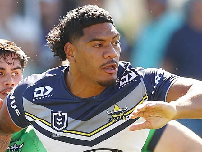 QUEANBEYAN, AUSTRALIA - FEBRUARY 25: Thomas Mikaele of the Cowboys offloads during the NRL Pre-season challenge match between Canberra Raiders and North Queensland Cowboys at Seiffert Oval on February 25, 2024 in Queanbeyan, Australia. (Photo by Mark Nolan/Getty Images)
