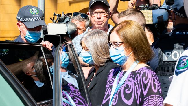 A heavy police and Sherrif’s Officers presence around chief public health officer Nicola Spurrier as anti-vaccine mandate protesters mob her outside the Supreme Court. Picture: NCA NewsWire / Morgan Sette