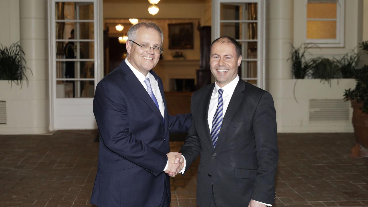 Prime Minister Scott Morrison and Treasurer Party Josh Frydenberg at Government House in Canberra after being sworn in by the Governor General Sir Peter Cosgrove. Picture by Sean Davey.