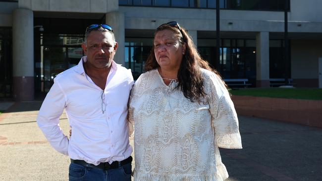 The parents of Ailsa "Rani" Satini leave Cairns Supreme Court after the sentencing of Morris Ling, who pleaded guilty to manslaughter.