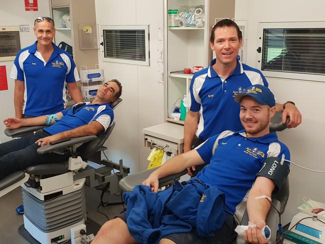 Jim's Pool Care Sydney East's Robert Sara (Randwick), Chris Stephandellis (Woollahra), franchisor Brad Papworth and Mark Turner (Hurstville) donate blood in Coogee. Supplied pic.