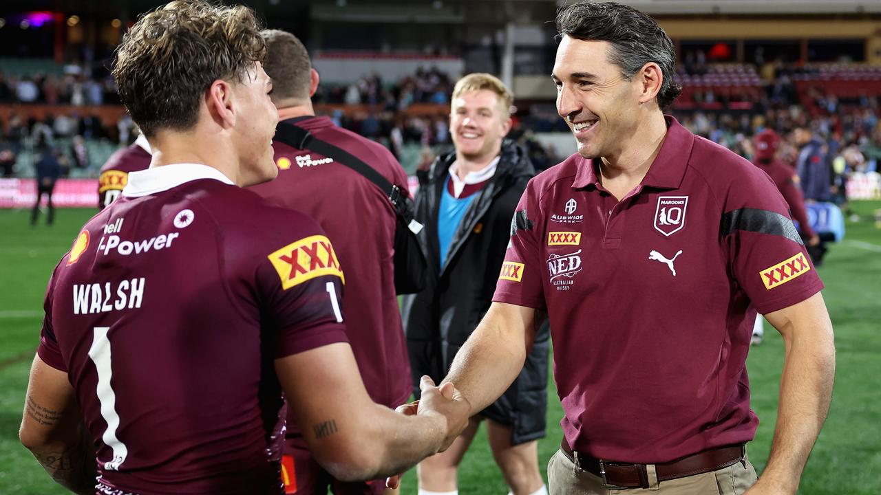 Billy Slater and Reece Walsh enjoy the Maroons’ Game I victory.