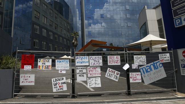 Protest signs are seen outside the Mantra Bell City Hotel in Preston, Melbourne, Victoria. Picture: Daniel Pockett