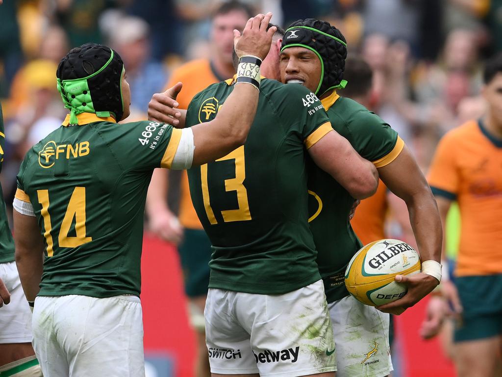 Kurt-Lee Arendse of the Springboks celebrates scoring a try with team mates during The Rugby Championship match between Australia Wallabies and South Africa Springboks at Suncorp Stadium on August 10, 2024 in Brisbane, Australia. (Photo by Matt Roberts/Getty Images)