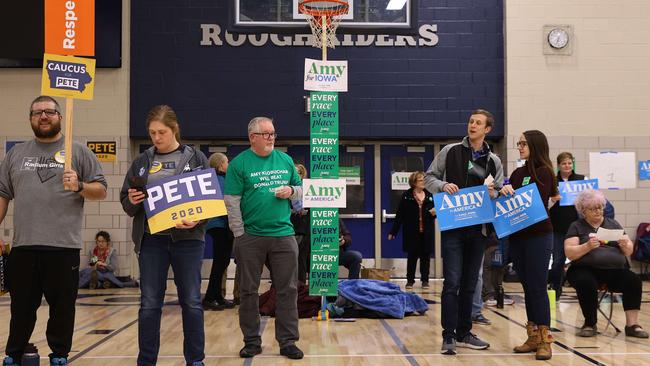 Iowa Democrats prepare to caucus for the presidential candidates at Roosevelt High School in Des Moines on Tuesday. Picture: AFP