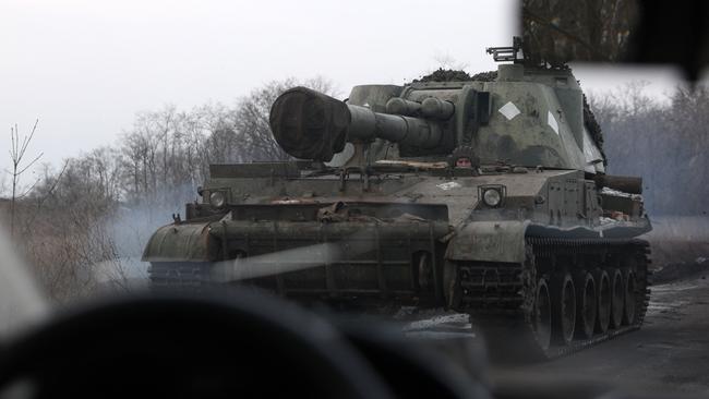 A Ukrainian 2S3 Akatsiya self-propelled gun advances on a road not far from Bakhmut, Donetsk region, on Tuesday. Picture: AFP