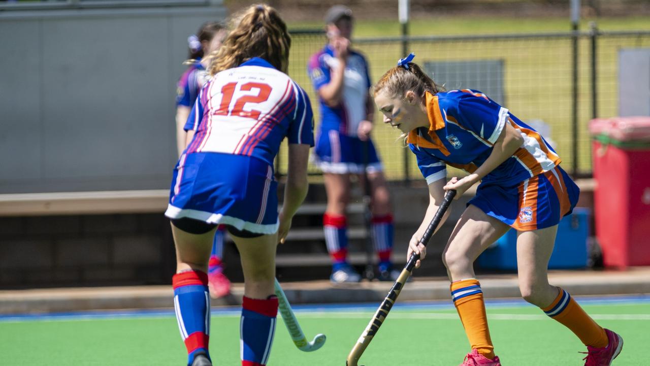 Tahlia Hess (right) of Newtown against Rangeville in J2 girls grand final hockey at Clyde Park, Saturday, September 10, 2022. Picture: Kevin Farmer