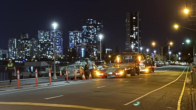 Multiple cars were towed from Marine Pde, Labrador on Monday night. Picture: Facebook/Emily Pickering.