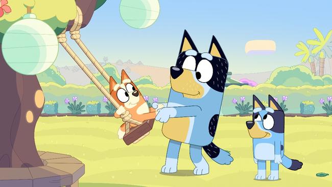 Bingo, dad Bandit and the eponymous Bluey in a scene from the series.