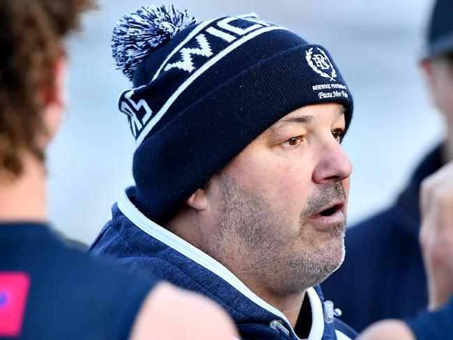 Berwick Head Coach Clint Evans speaks to his players during the round five EFNL Premier Division Eastland Senior Mens match between Berwick and Balwyn at Berwick Edwin Flack Oval, on May 11, 2024, in Melbourne, Australia. (Photo by Josh Chadwick)