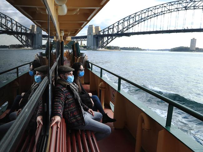 7/7/21: Giovanni Pipitone and Rosy Scatigna on a Manly ferry. John Feder/The Australian